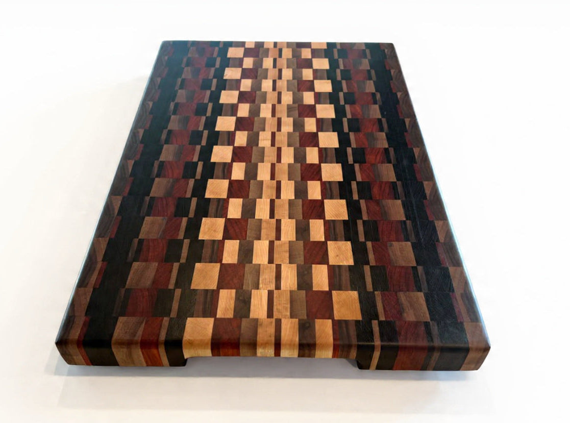 Wooden cutting board with a checkered pattern on a white background