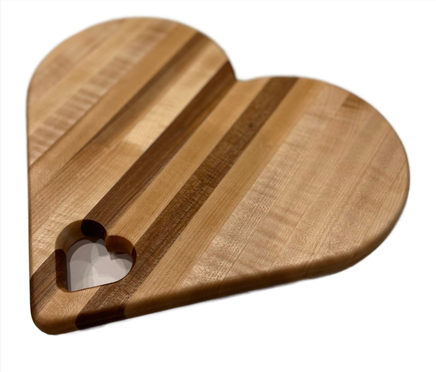 Heart-shaped charcuterie board made from premium wood, featuring a unique and charming design perfect for serving cheeses, meats, and appetizers.