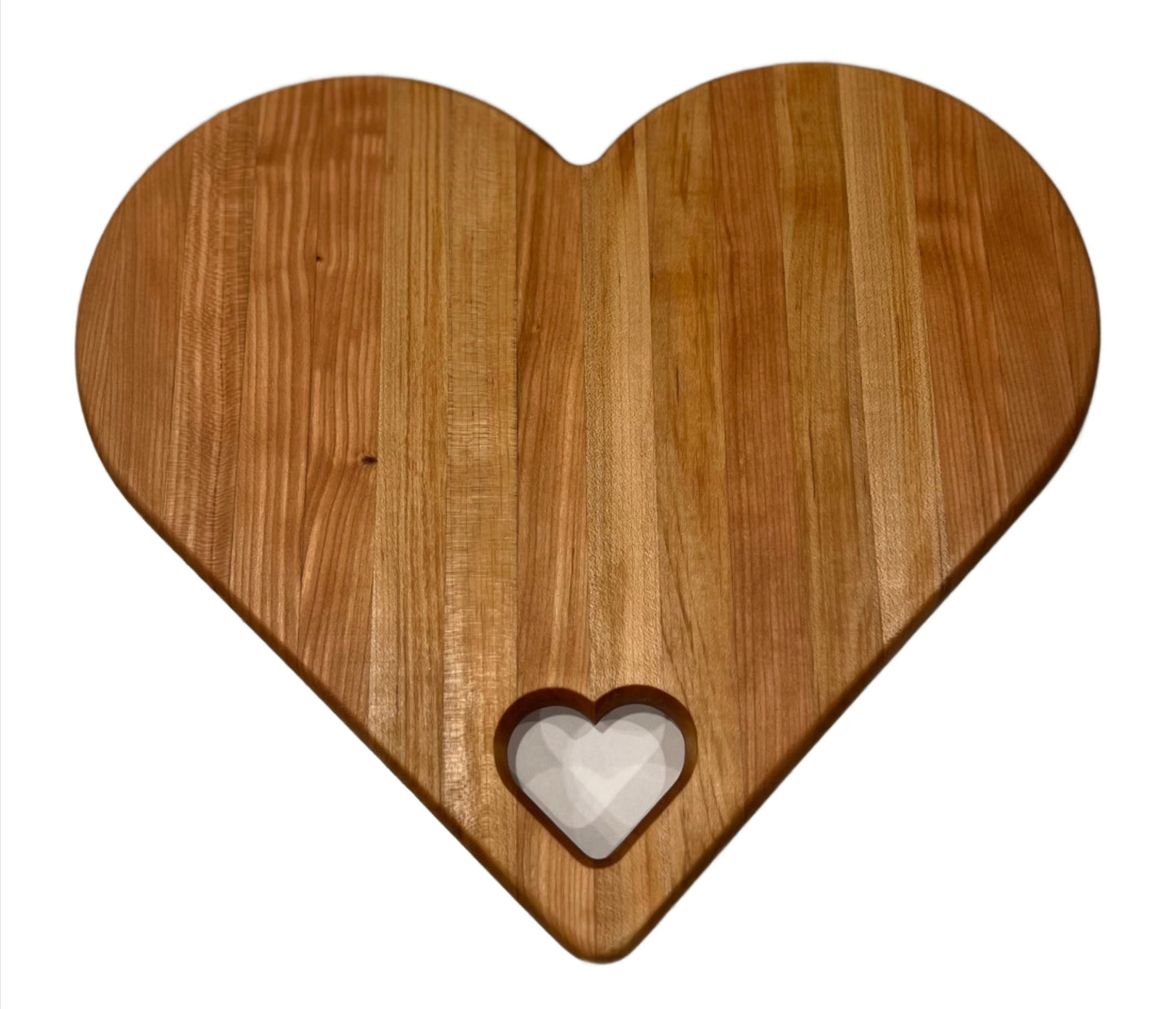 Heart-shaped charcuterie board made from premium wood, featuring a unique and charming design perfect for serving cheeses, meats, and appetizers.