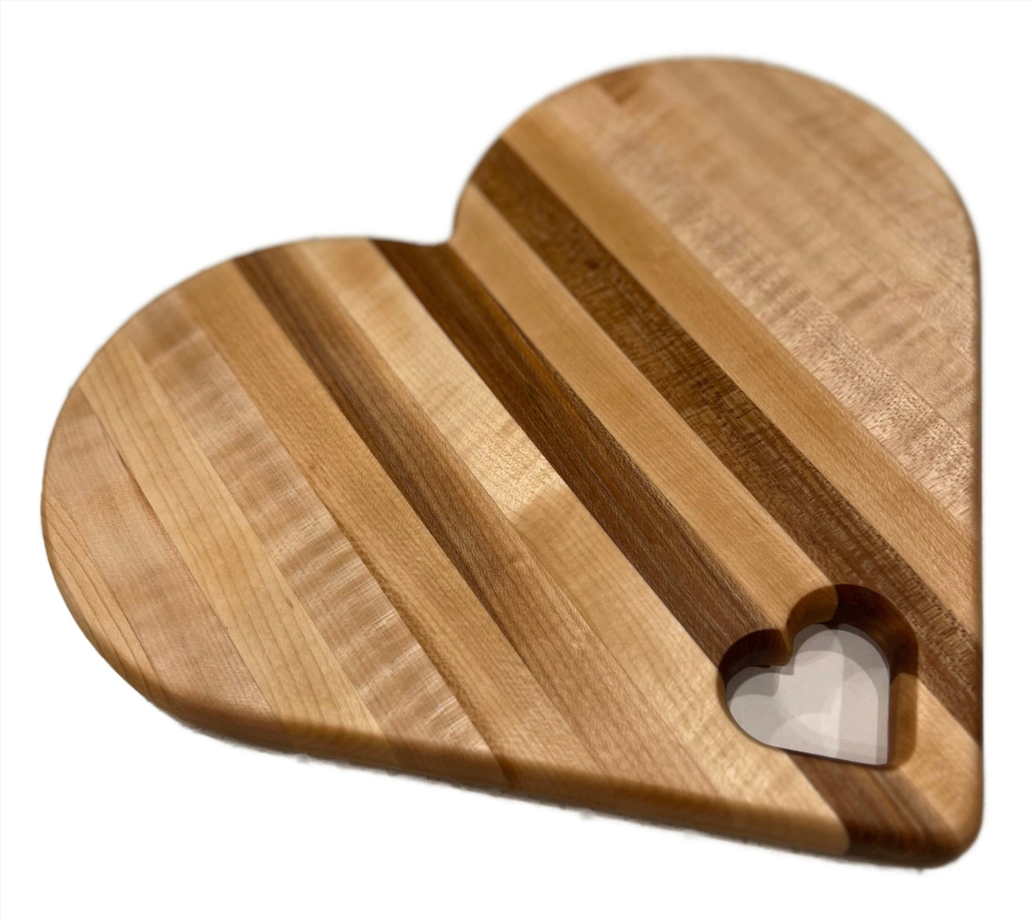 Heart-shaped charcuterie board made from premium wood, featuring a unique and charming design perfect for serving cheeses, meats, and appetizers.