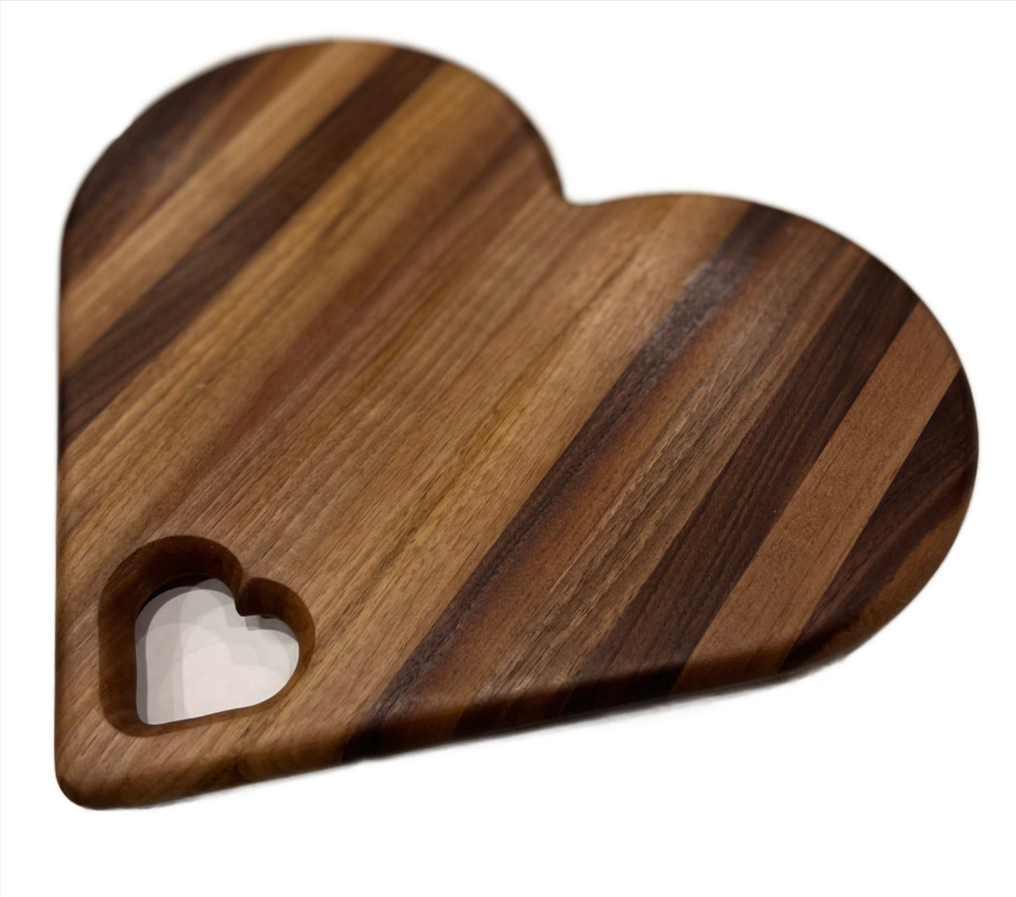 Heart-shaped charcuterie board made from premium wood, featuring a unique and charming design perfect for serving cheeses, meats, and appetizers.