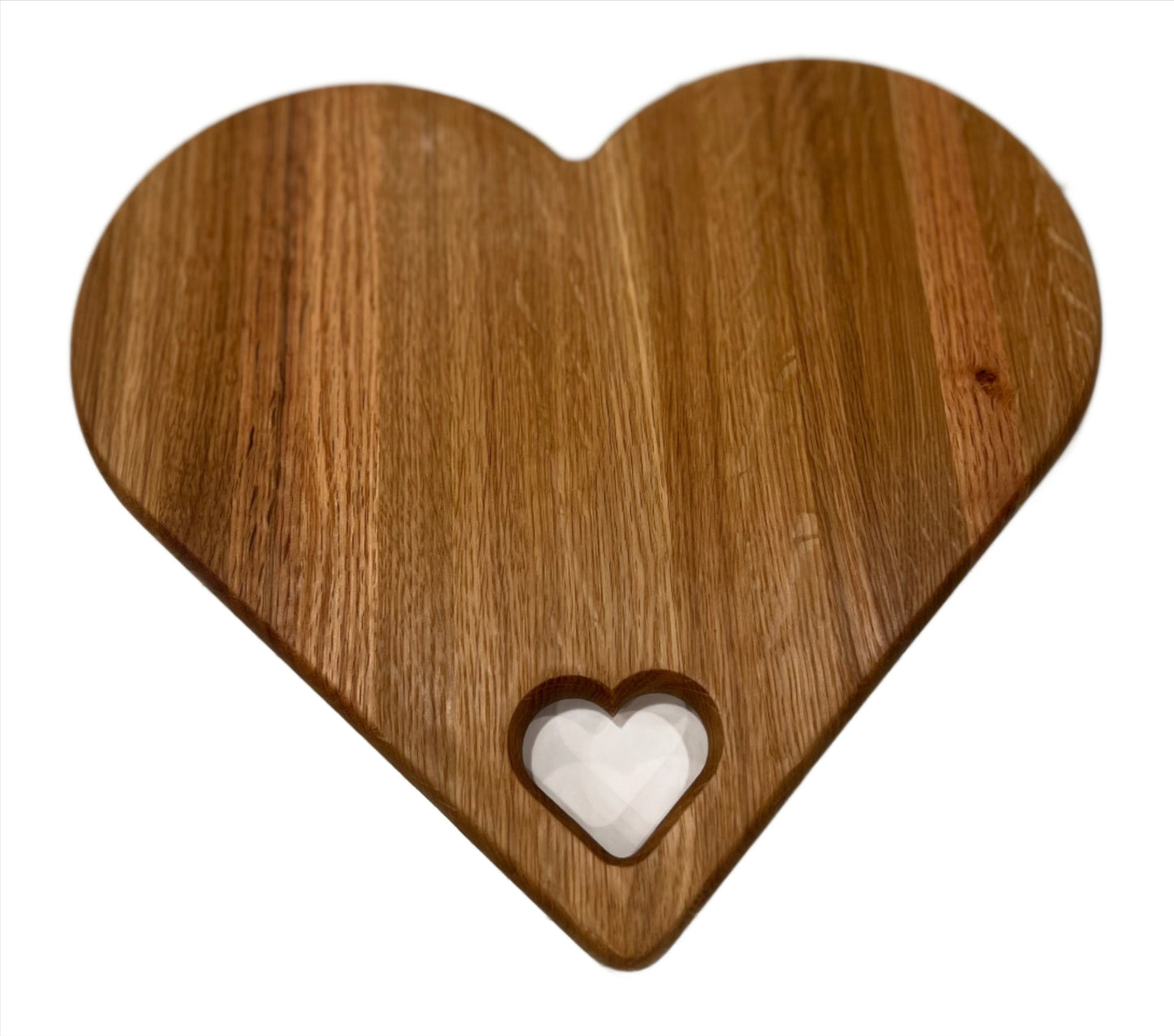 Heart-shaped charcuterie board made from premium wood, featuring a unique and charming design perfect for serving cheeses, meats, and appetizers.