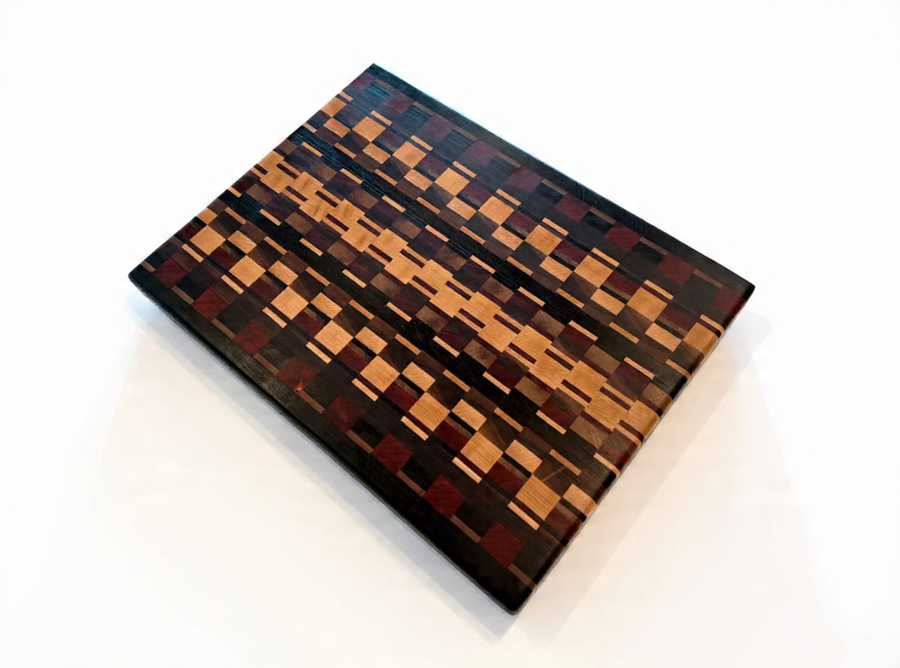 Wooden box with a geometric pattern on a white background