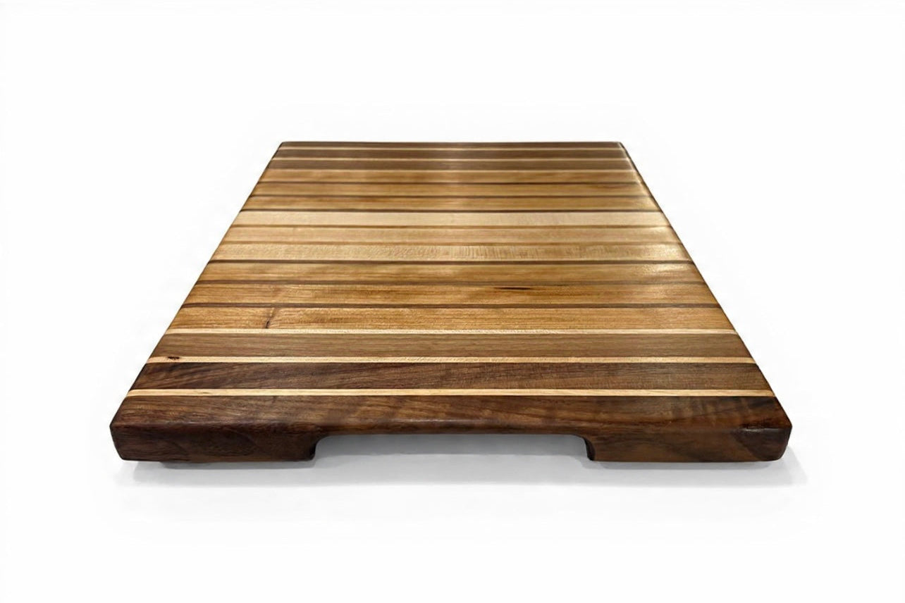 Wooden cutting board with a striped pattern on a white background
