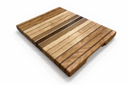 Wooden cutting board with striped pattern on a white background