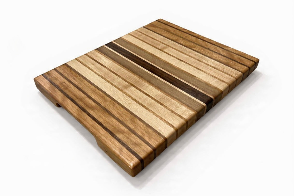 Wooden cutting board with striped pattern on a white background