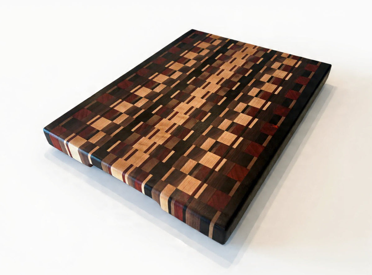 Wooden cutting board with a checkered pattern on a white background