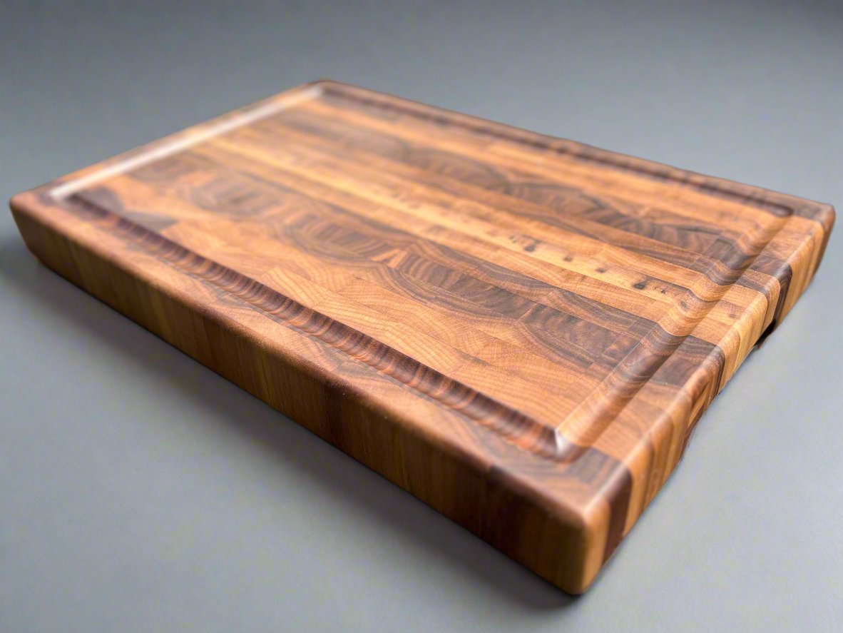 Walnut cutting board featuring a dark, elegant finish and rich wood grain, ideal for stylish and durable kitchen use.