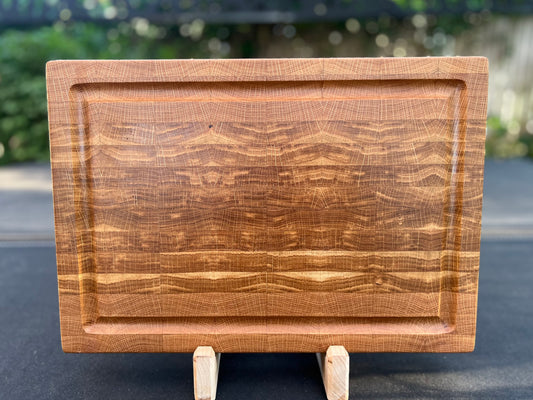 White oak cutting board with a textured end grain surface, showcasing its natural wood patterns and durability